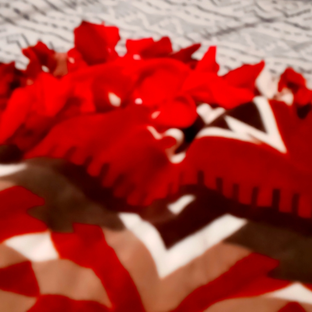 Handmade tie blanket made by Carrie red